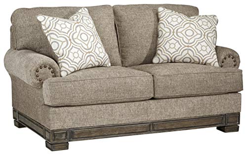 Signature Design by Ashley Einsgrove New Traditional Upholstered Loveseat with Nailhead Trim, Brown