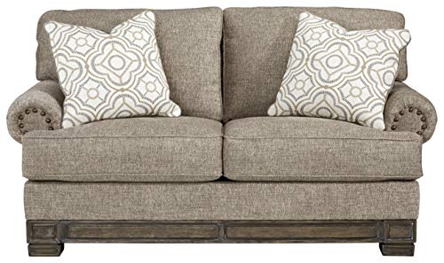 Signature Design by Ashley Einsgrove New Traditional Upholstered Loveseat with Nailhead Trim, Brown