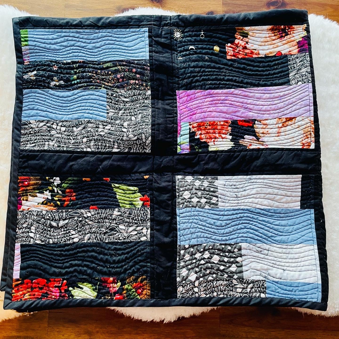 Quilt in Black, Blue, Violet and Grey.