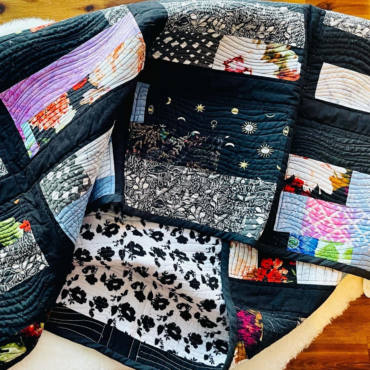 Quilt in Black, Blue, Violet and Grey.