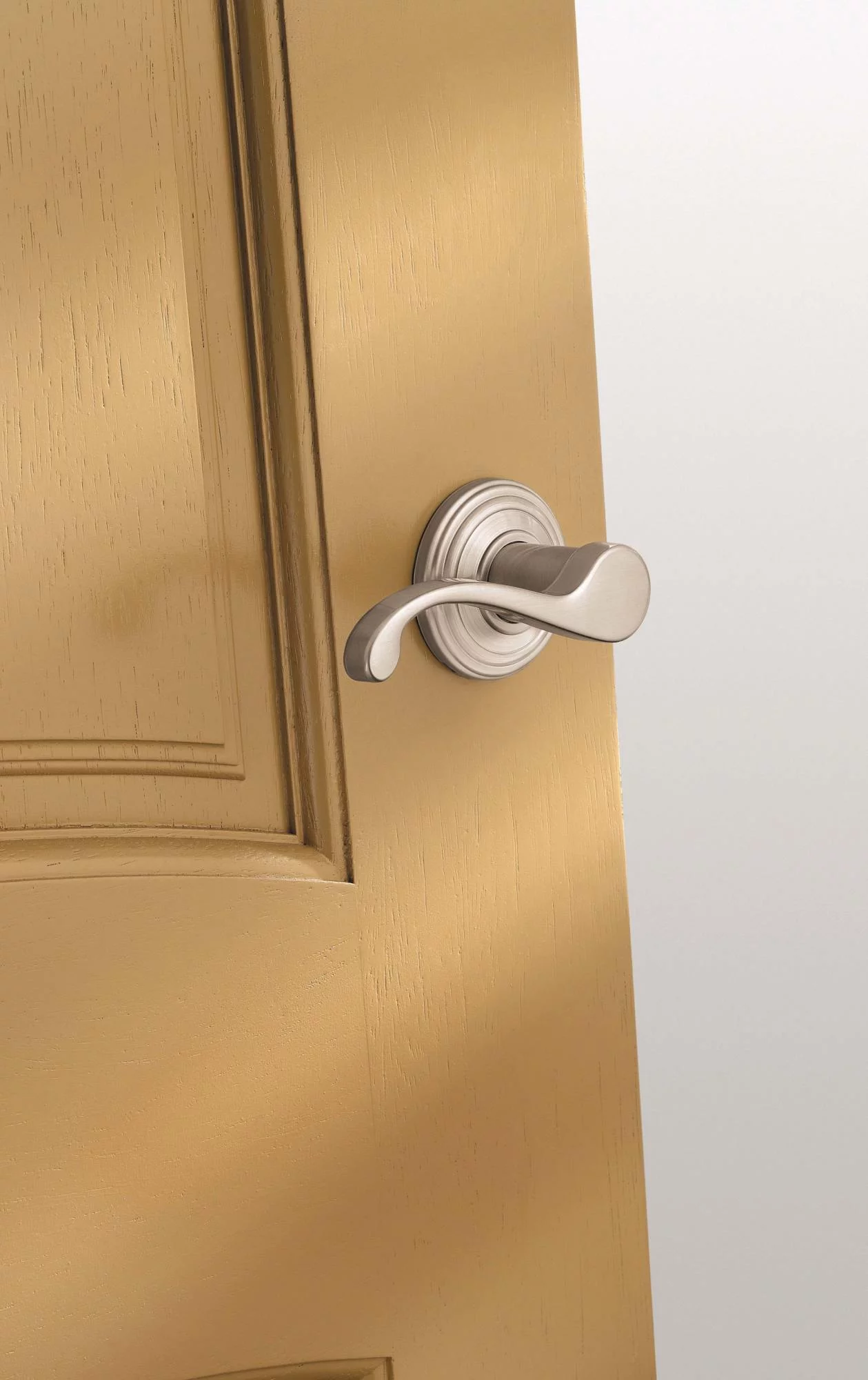 Kwikset Commonwealth Lever Passage in Venetian Bronze