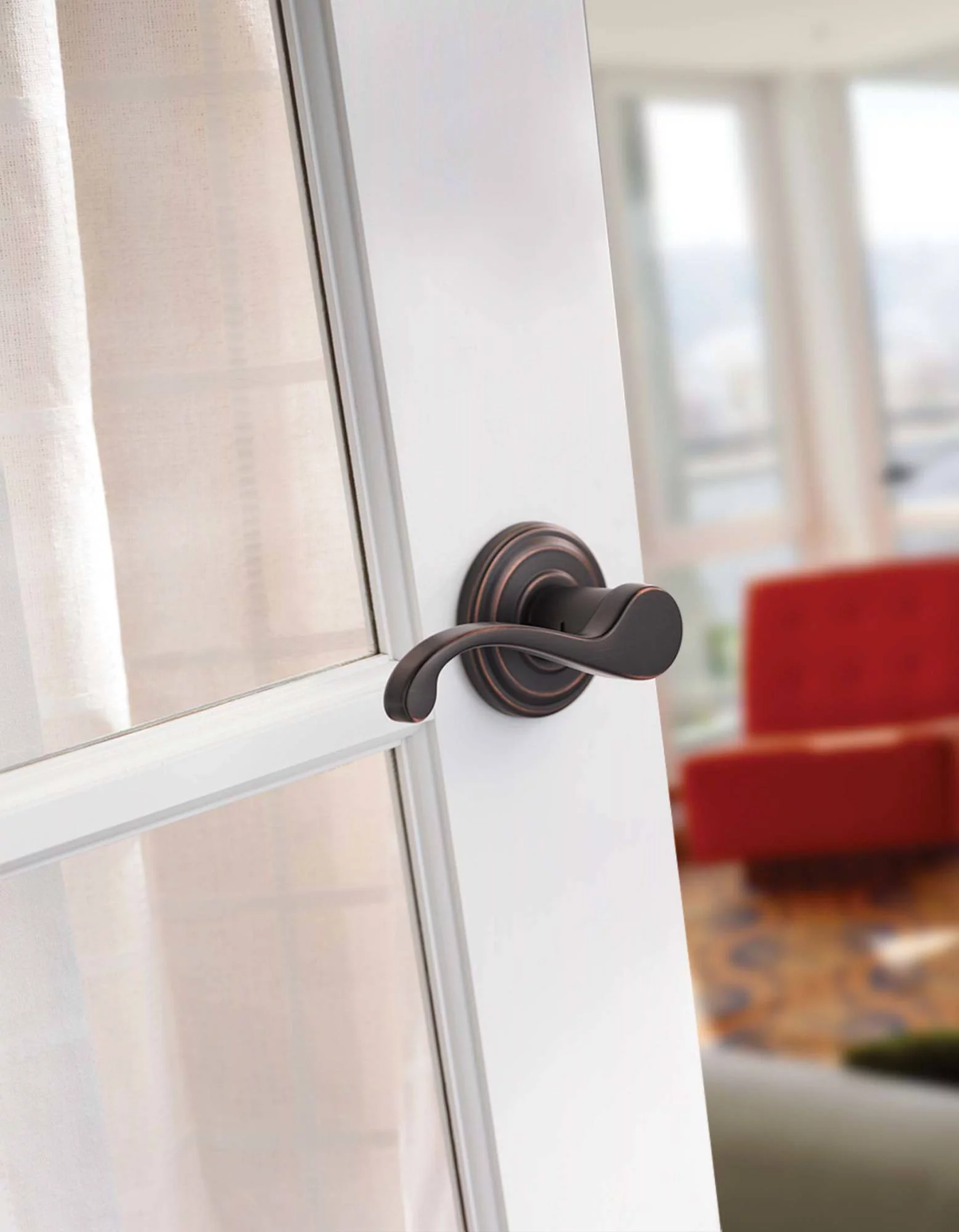 Kwikset Commonwealth Lever Passage in Venetian Bronze