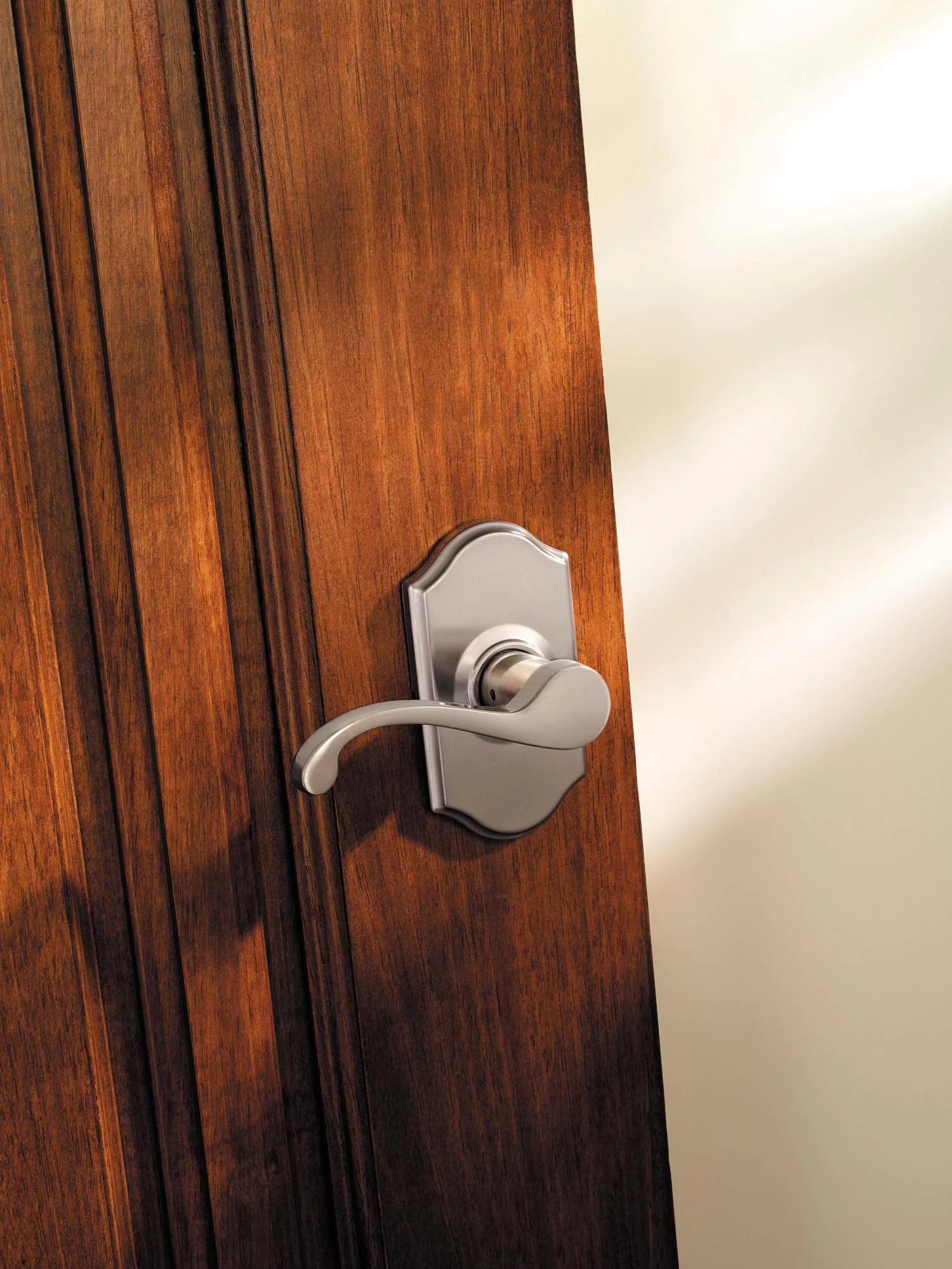 Kwikset Commonwealth Lever Passage in Venetian Bronze